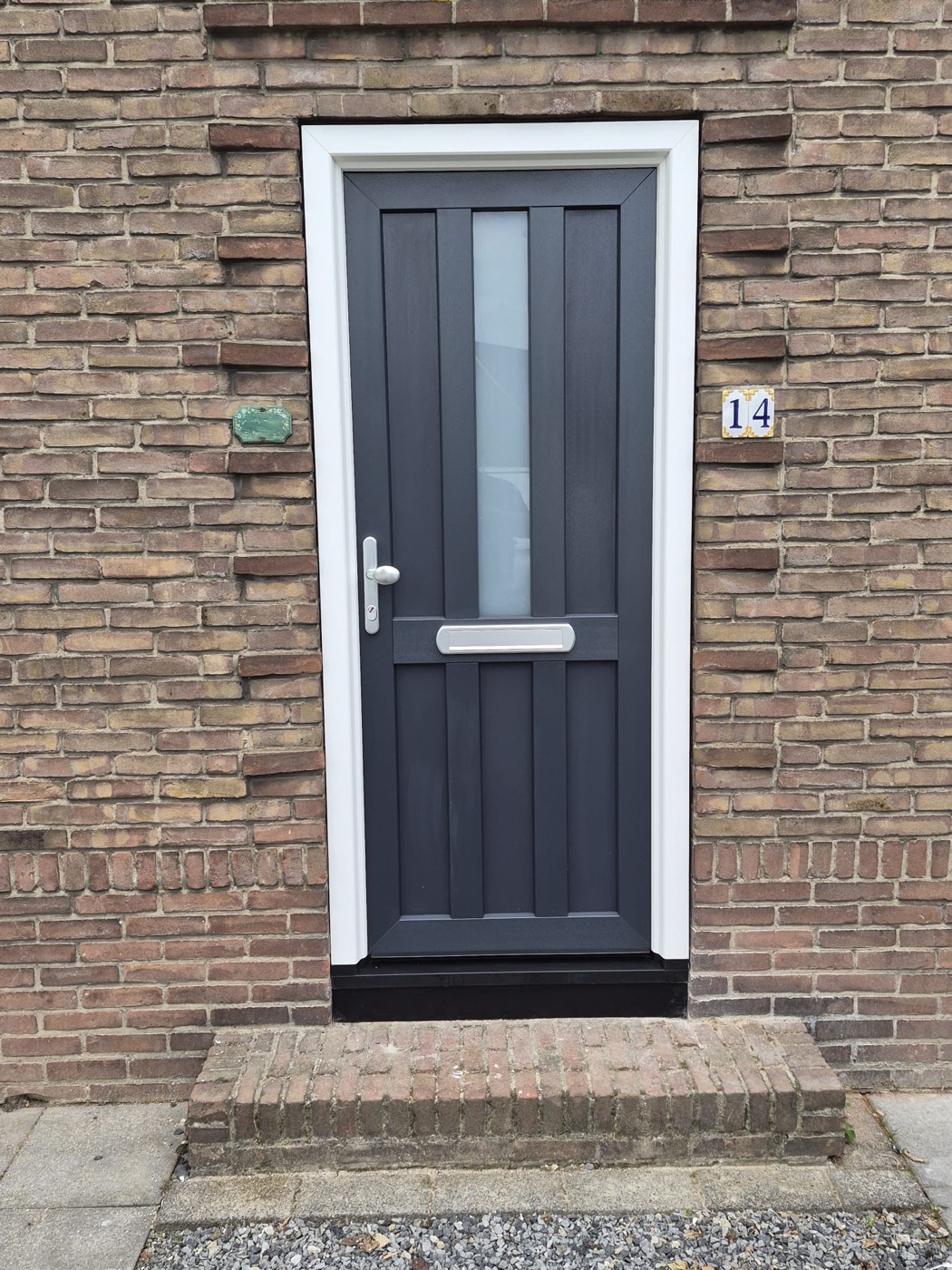 Voordeur antraciet met glasstrook